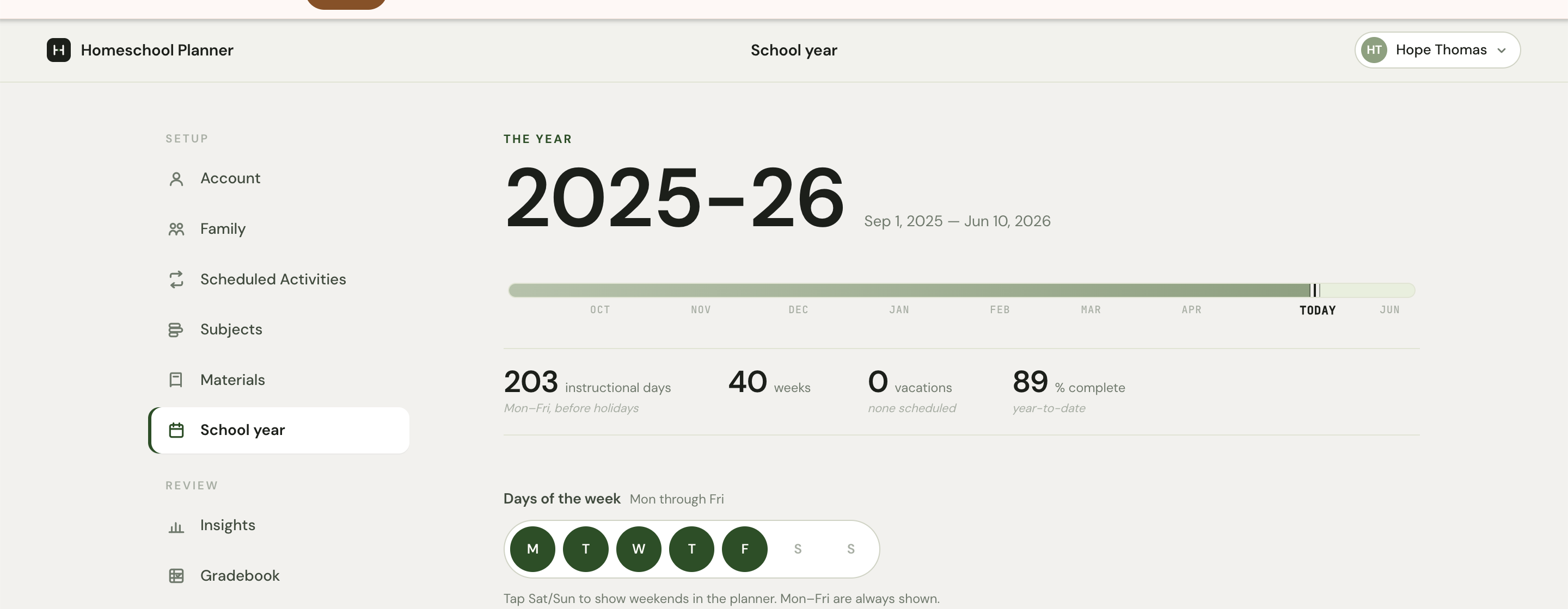The School year settings page with the year title at top, a date range to the right, a horizontal progress bar with month markers, four stat cells beneath, and Days of the week and School years sections starting below.